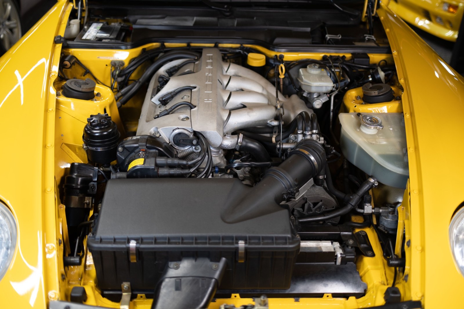 Porsche 968 engine bay showing the 3.0-liter four-cylinder engine